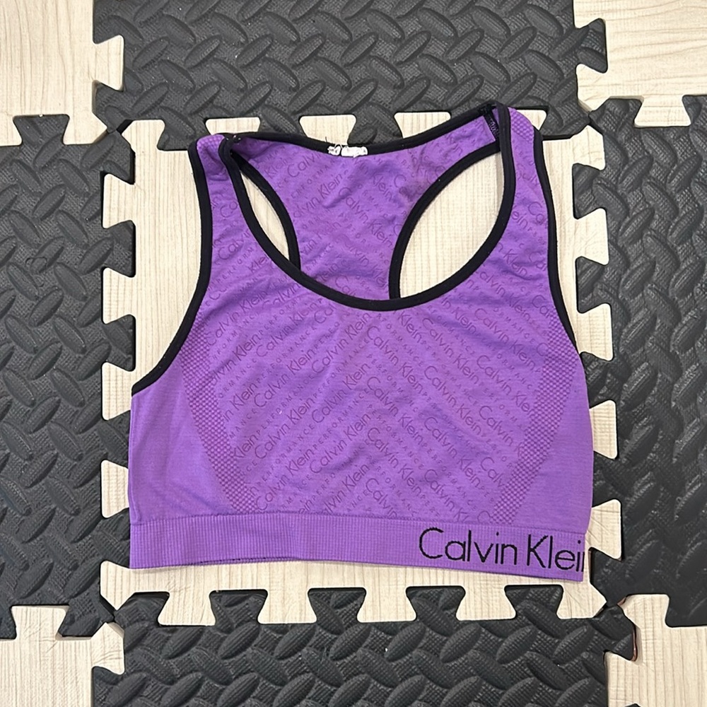 Calvin Klein Women's Medium Impact Reversible Sports Bra in purple